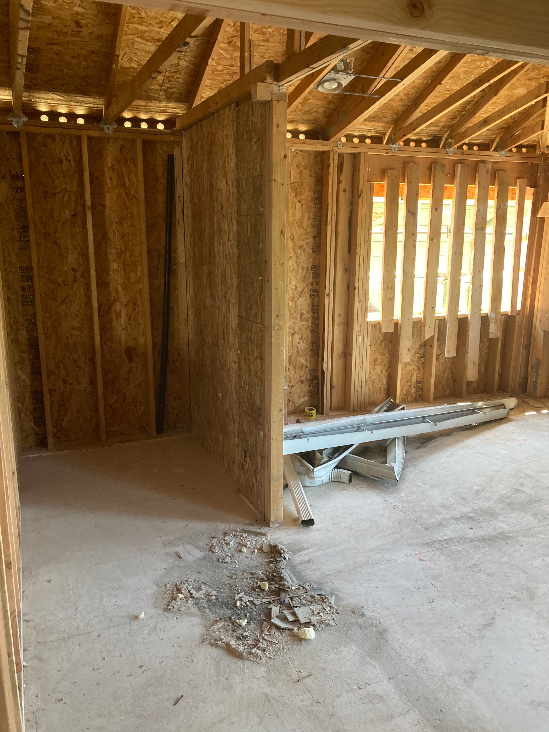 Roof tear-off and interior strip-out by Sledge Seattle