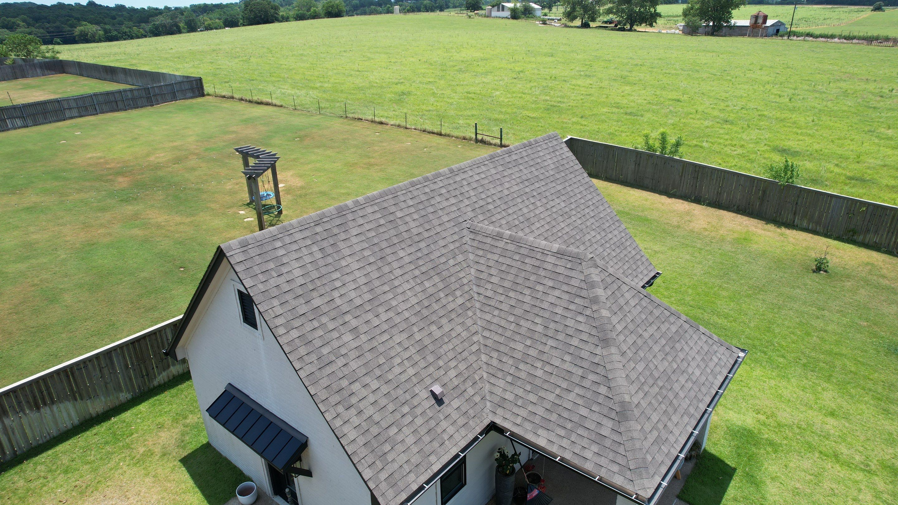 Architectural Shingle and Standing Seam Metal Roof Installation in Mount Selman by Sky High Roofing