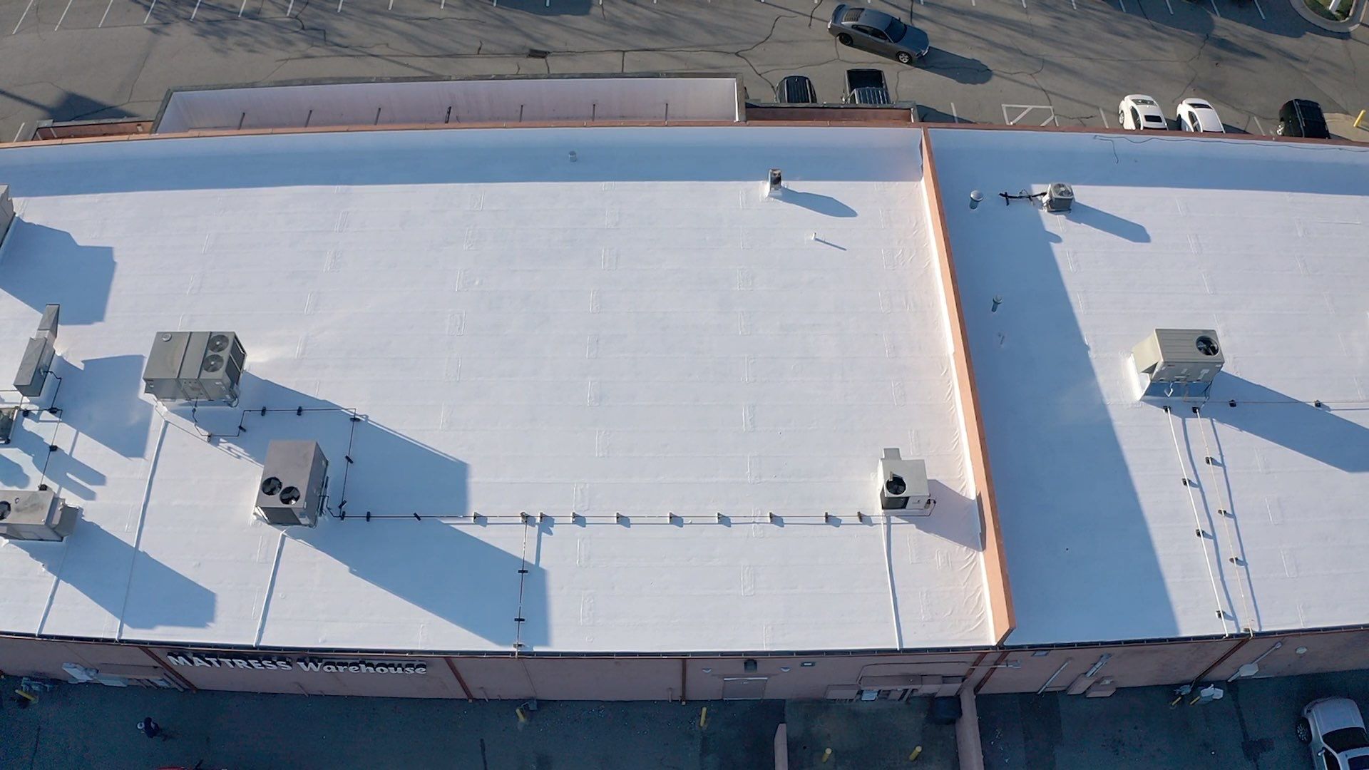 Commercial Coating using Poly Urerthane and Silicone Coating by Just In Time Roofing and Restoration