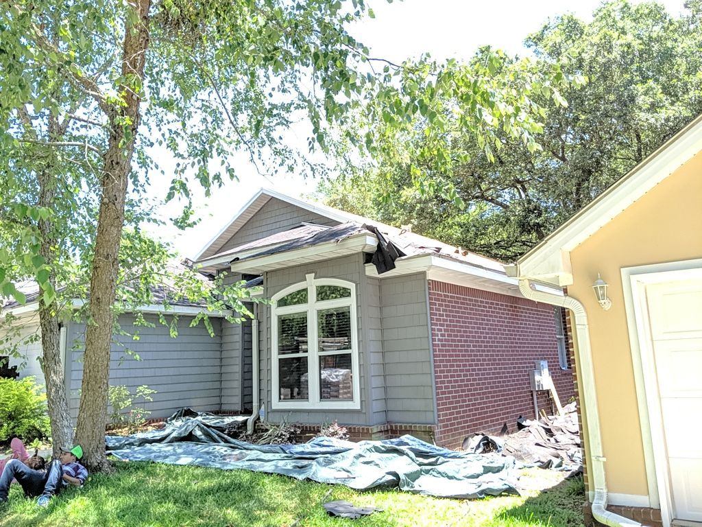 Residential Roofing Installation using Roof Replacement by American Roofing & Construction LLC