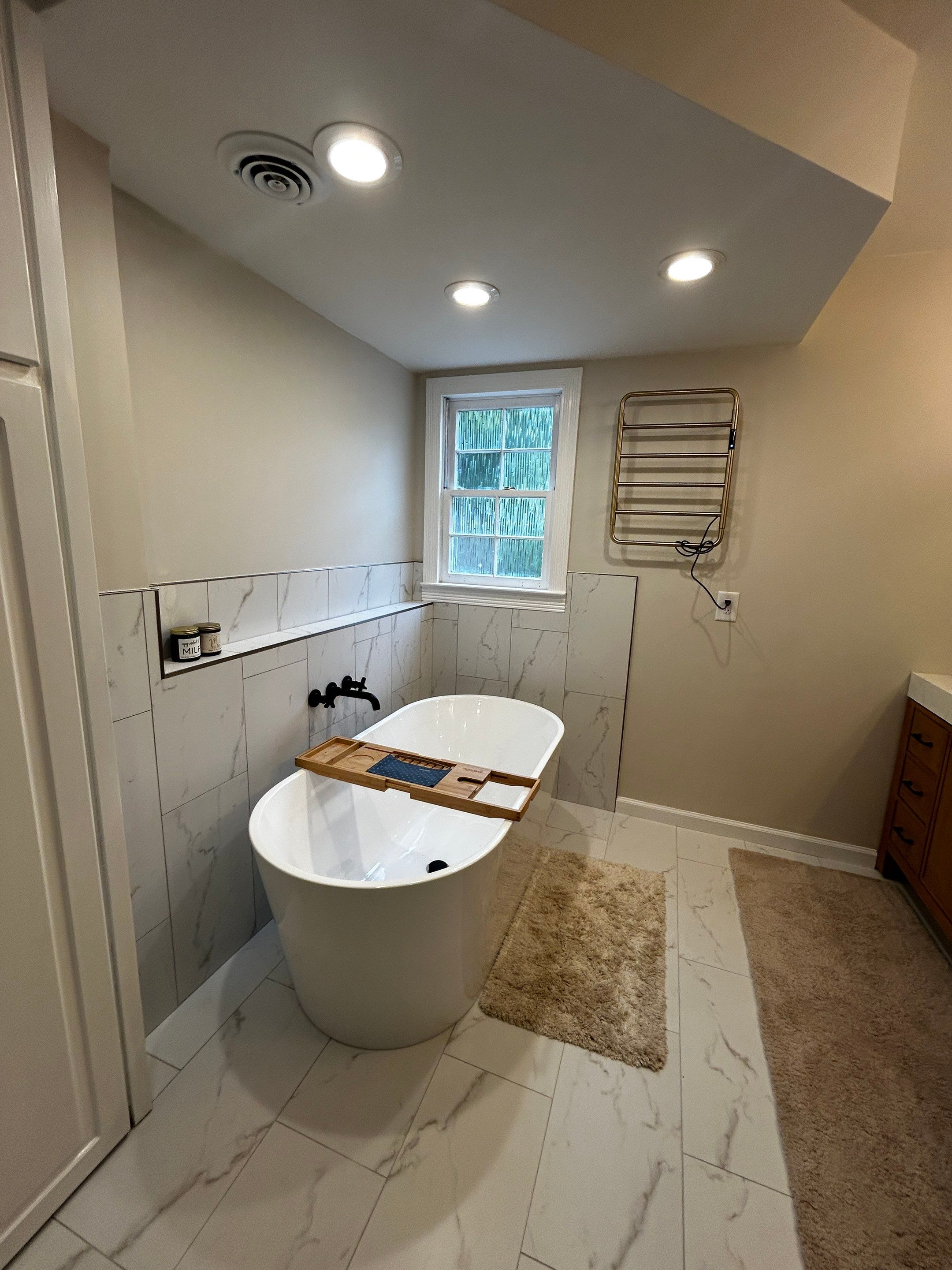 Spa like bathroom by Footprints Bath and Tile of East Atlanta