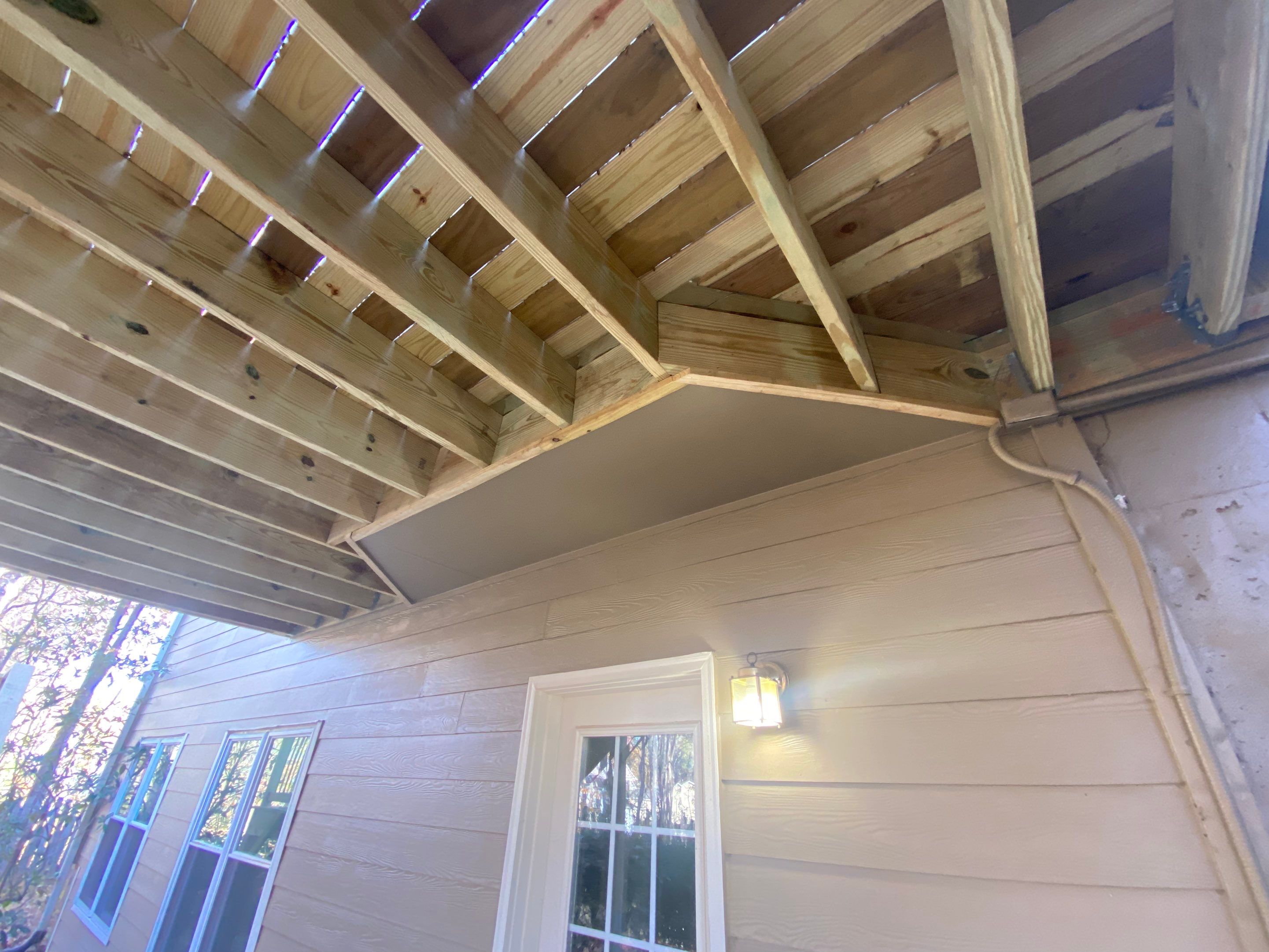 Elevated Wooden Deck and Staircase Construction in Cumming by Swift Home Renovations