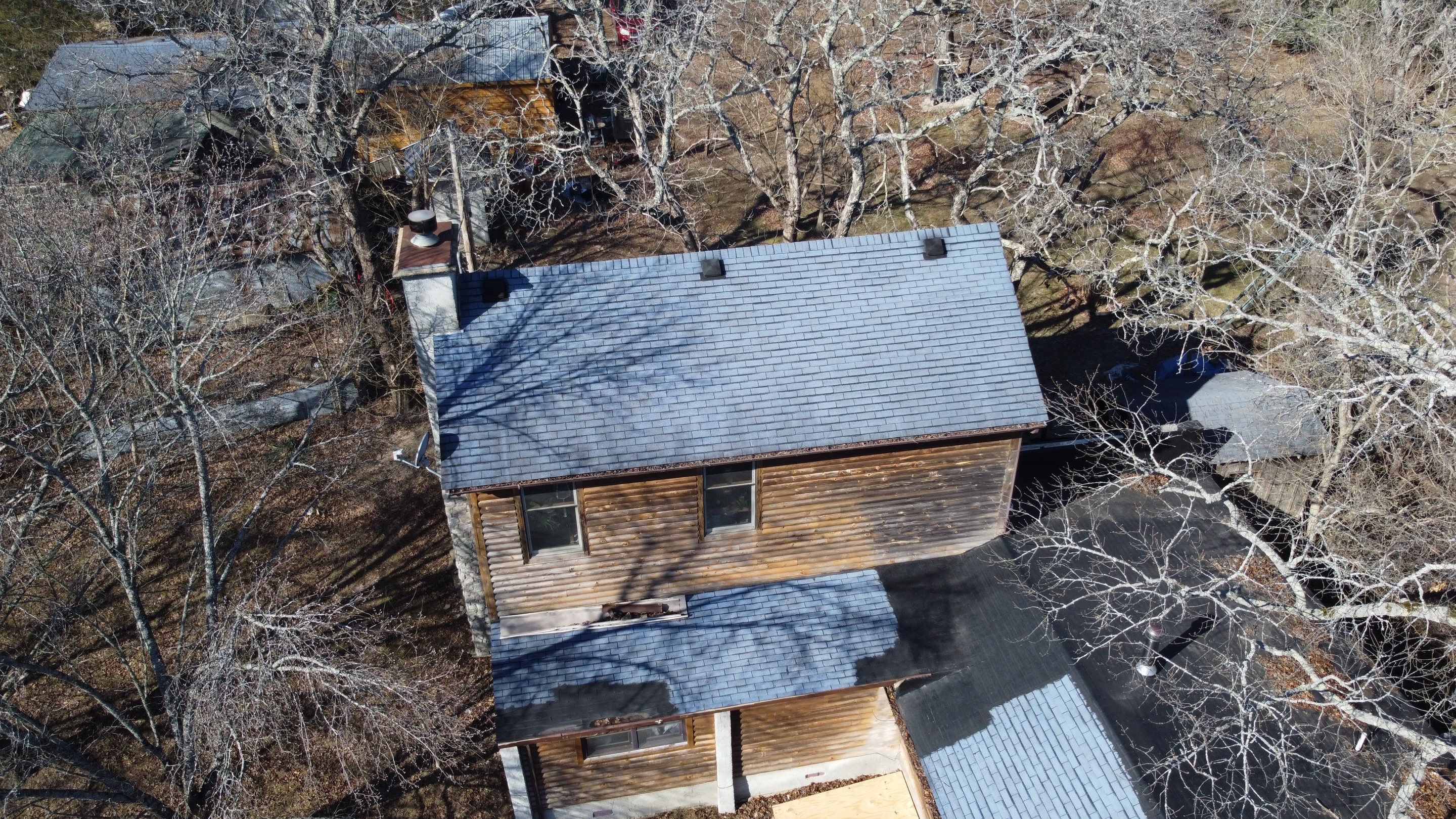 Residential Roof + Gutters & Downspouts Install  by Titan Commercial & Residential Roofing 