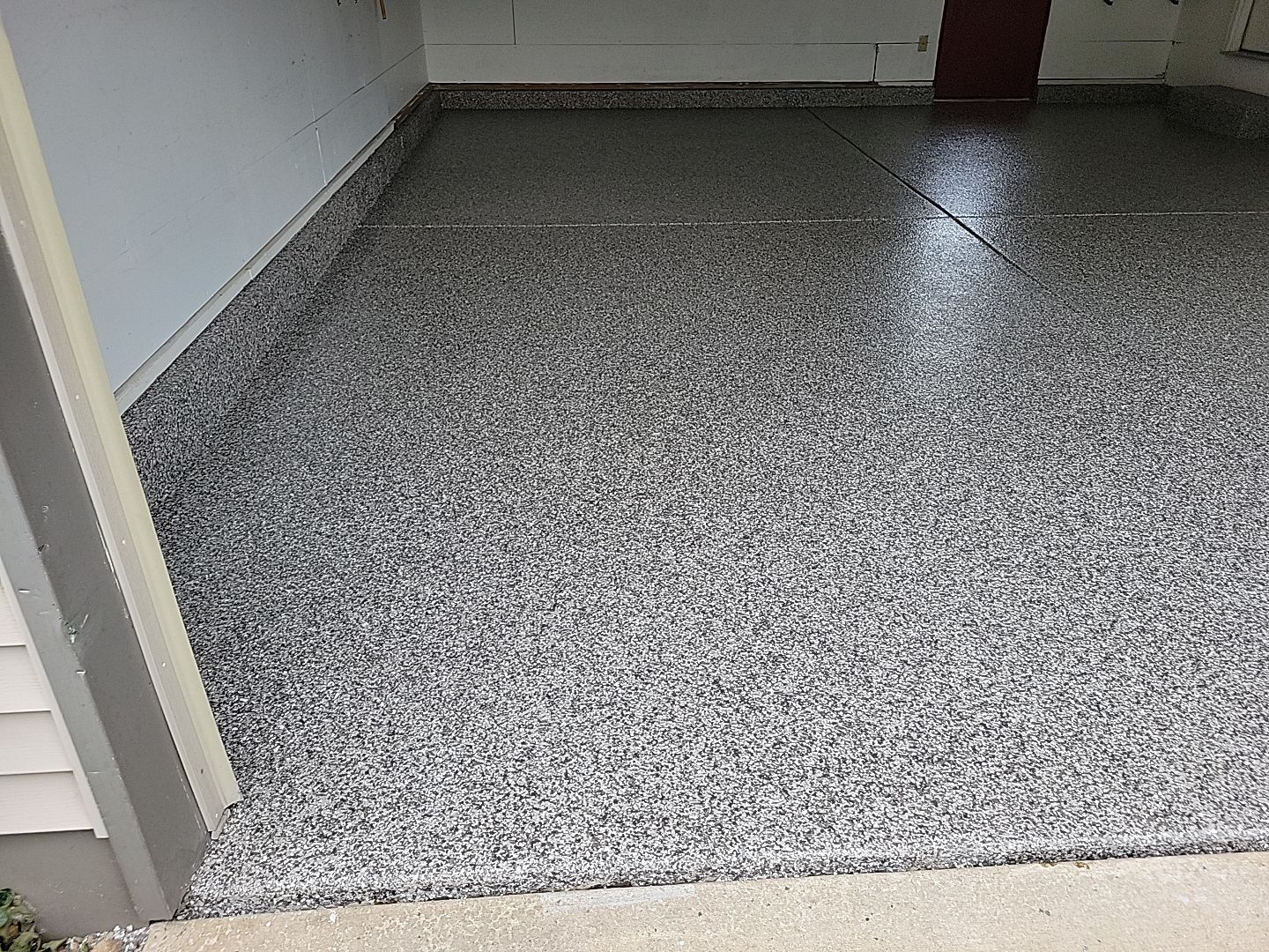 Garage and Porch Coating in Osceola by Innovative Spaces / Innovative Concrete Coatings