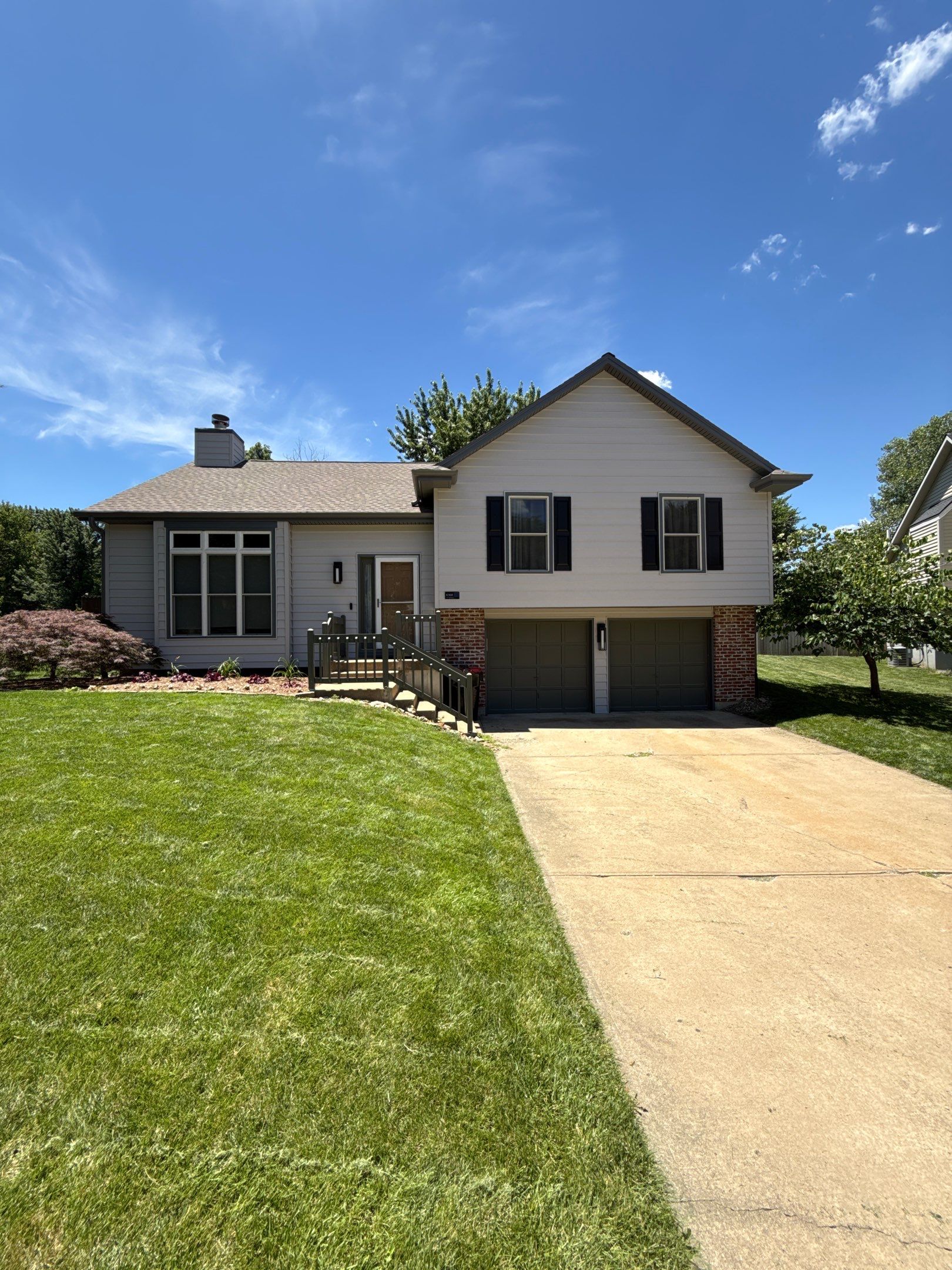 Whole-Home Craneboard Siding Replacement and Exterior Renovation in Shawnee by EEC Windows, Siding & Roofing