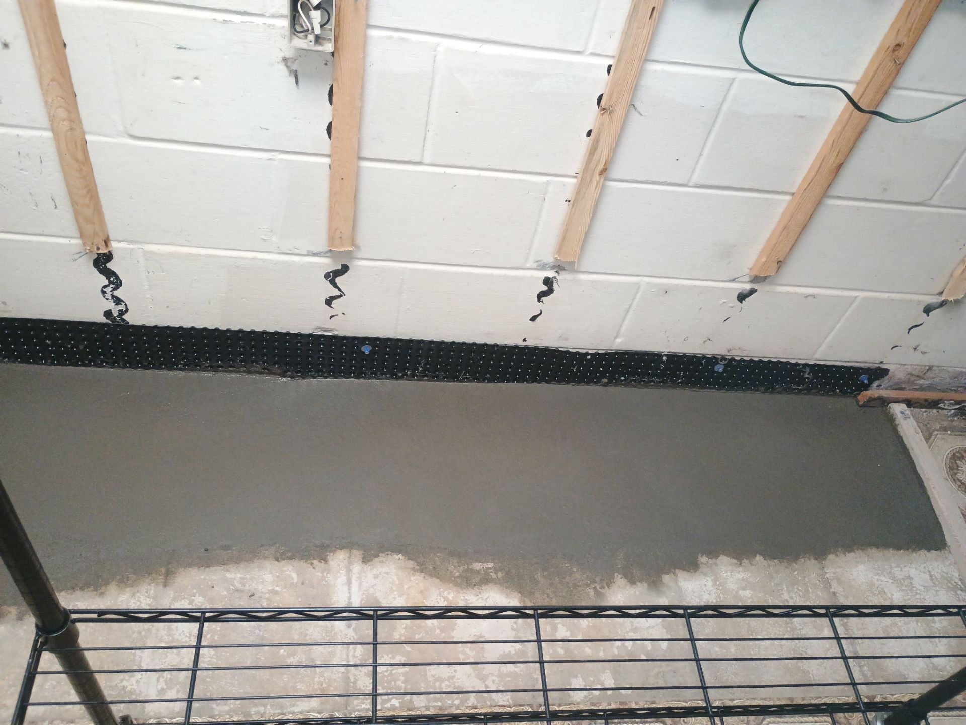 Drain Tile, Sump Pump & Buried Discharge in Columbia Heights by Waterproofing Northeast