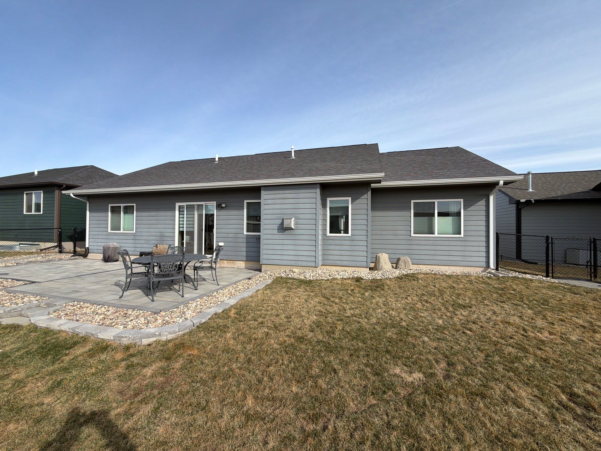 Residential Exterior Painting and Siding Refresh in Sioux Falls by Select Painting, Coatings & Garage Cabinets