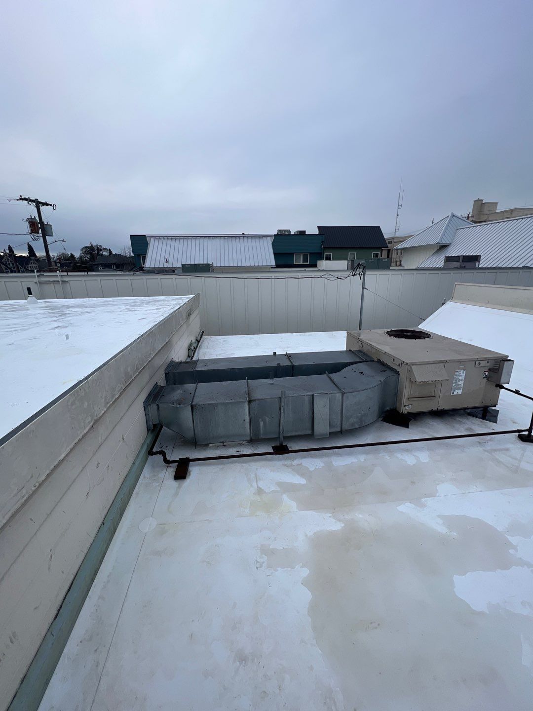 Commercial Flat Roof Installation using GAF 60Mil TPO  by Orezona Building & Roofing Company, Inc.