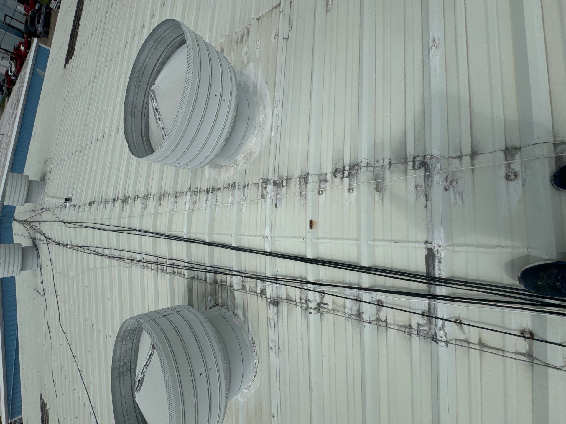 Metal Roof Maintenance- Skylight Installation  by Associates Roofing Unlimited 