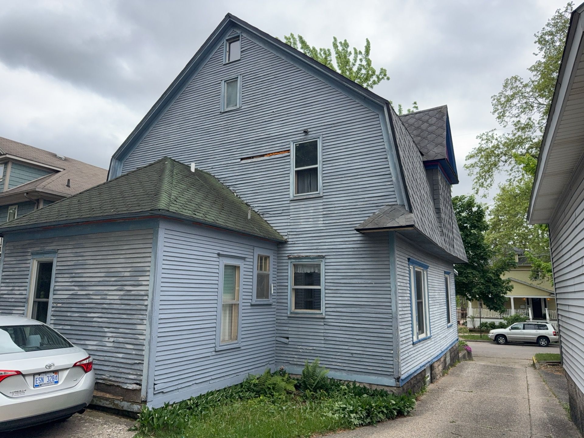SIDING, DECK AND NEW PORCH  by Avalon Roofing and Exteriors