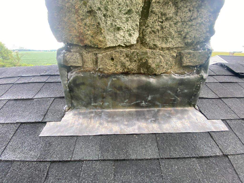 Storm damage roof replacement by Nitro Roofing and Construction