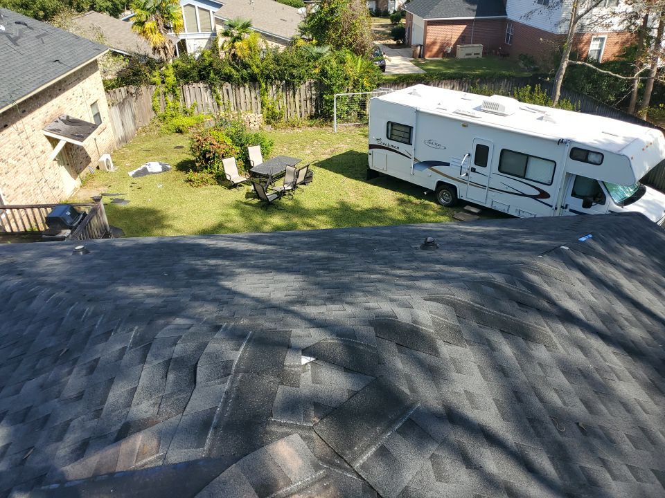 Residential Roofing Installation using Roof Replacement by American Roofing & Construction LLC