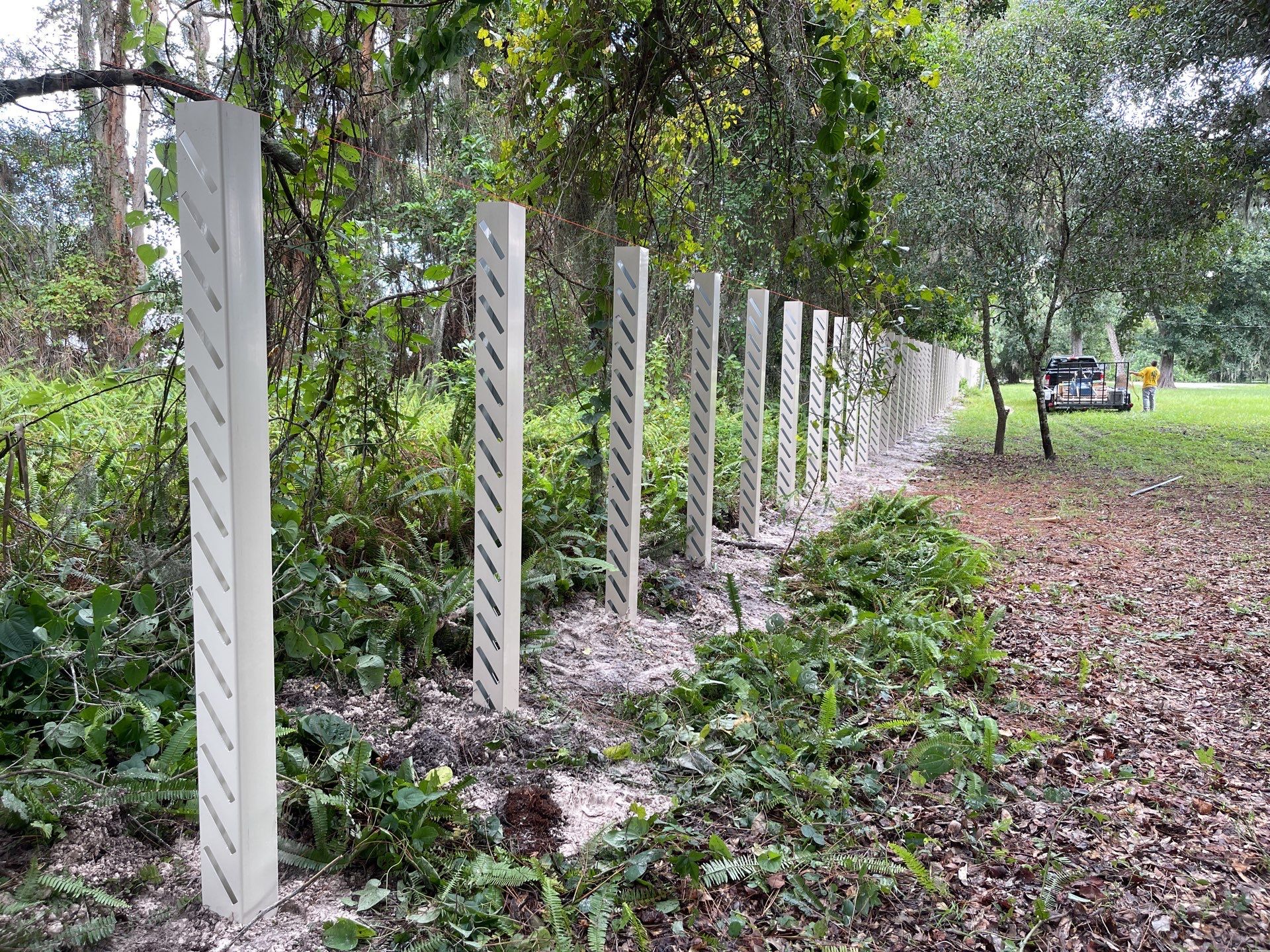 Sarasota, FL. Vinyl Fence Installation using Tan Vinyl Louvered Vinyl Fence by Asap fence and gates, LLC