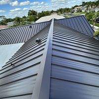 24ga 1.5" Mechanical Seam Dark Bronze by Total Roofing System The Metal Roof Experts