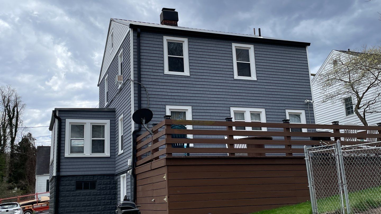 Siding Installation using Exterior Portfolio Portsmouth Vinyl Cedar Shakes by Secure Construction Company Inc
