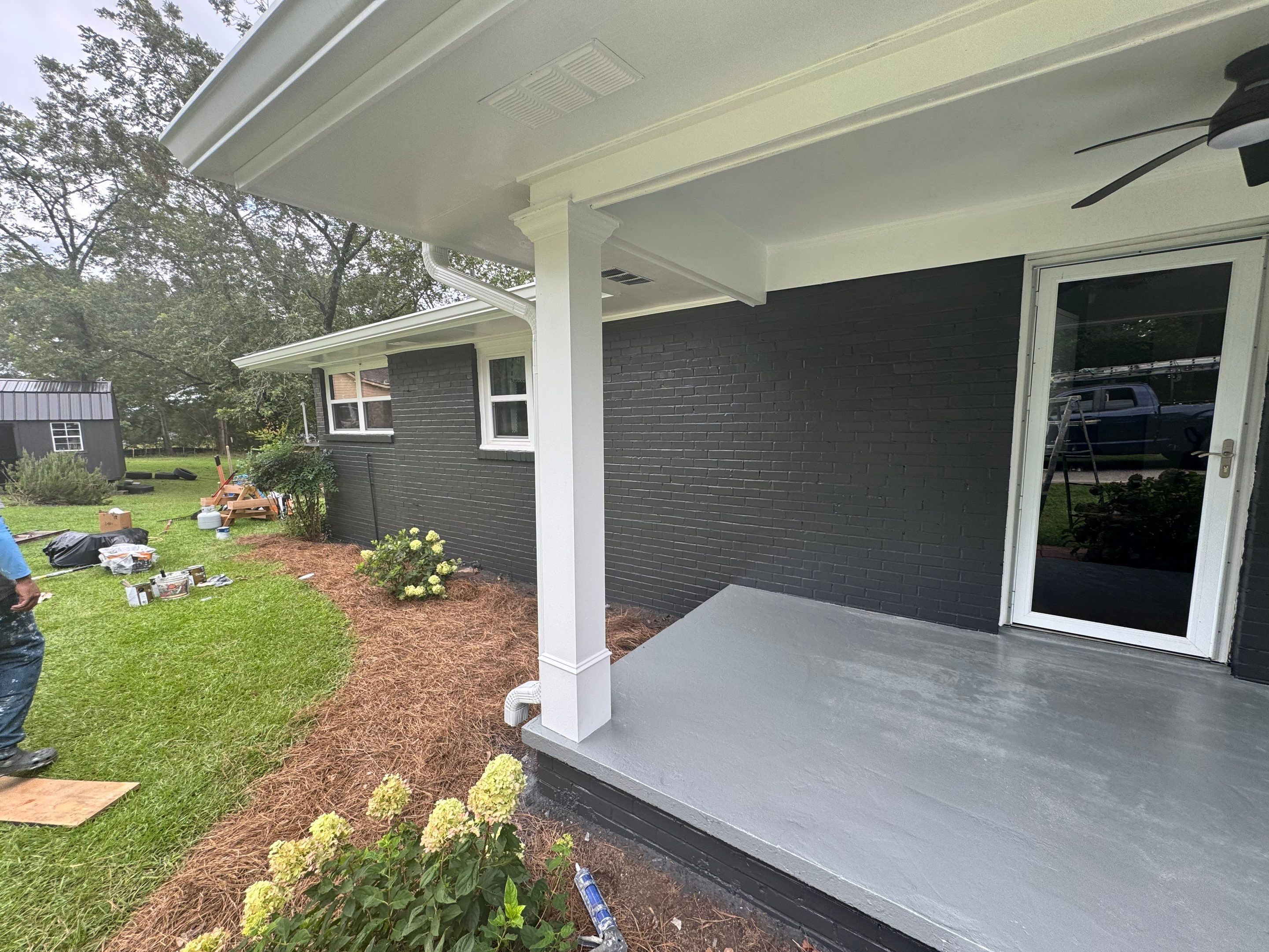 Social Circle Masonry Transformation with Dark Charcoal Exterior Painting by PGP Surface Solutions, LLC