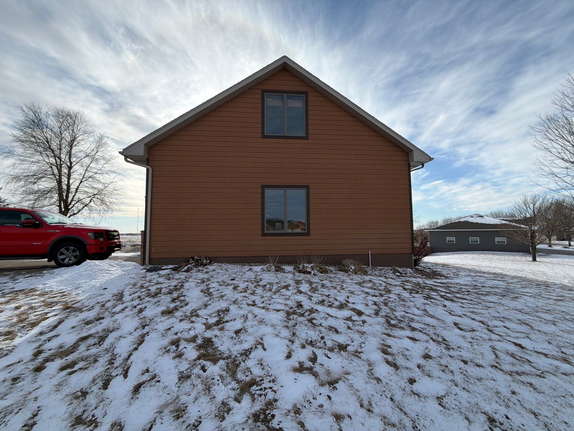 Residential Exterior Painting and Siding Restoration in Crooks by Select Painting, Coatings & Garage Cabinets