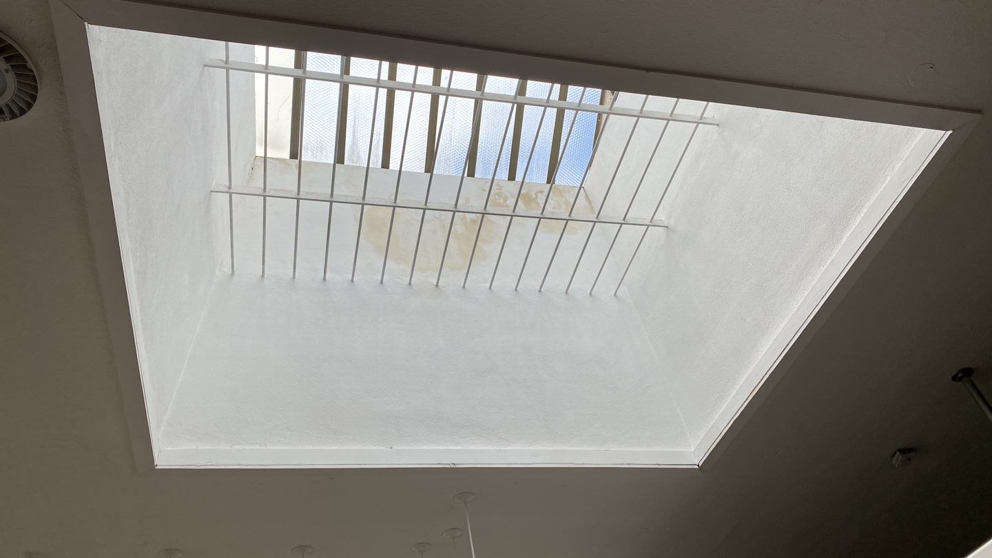 Polyurethane foam roof refurbish and recoating by Straight Edge Roofing Inc