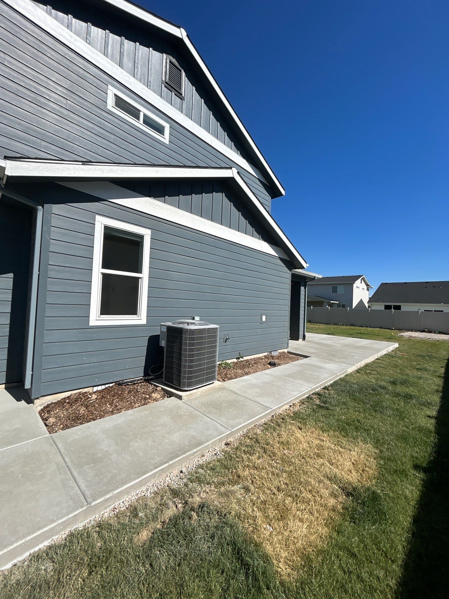 Patio Extension - Spanning to Driveway by Meridian Concrete | Meridian Curbing & Landscape