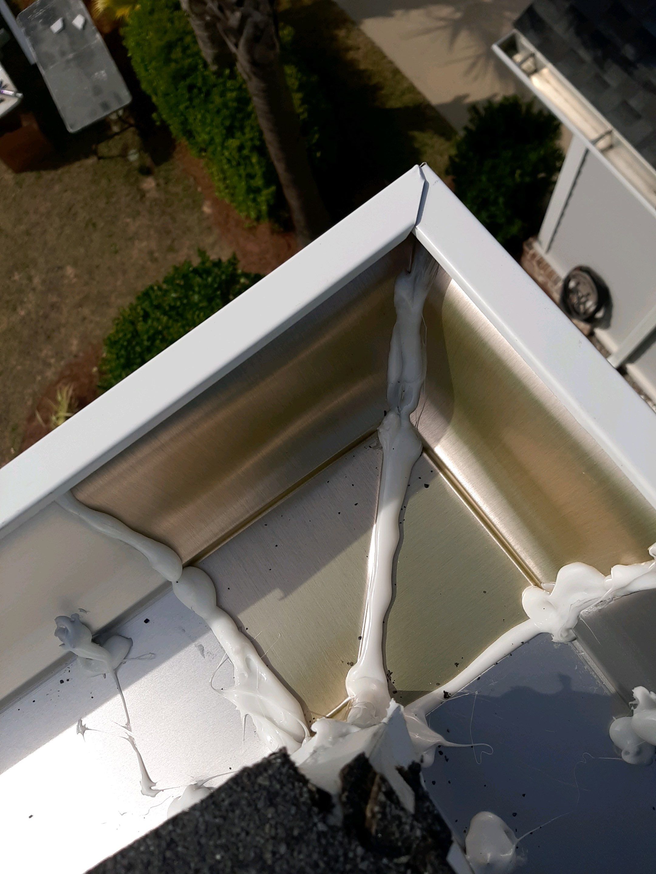 Gutter Installation Using White K-Style 6 Inch Seamless Gutters by Gutter Professors