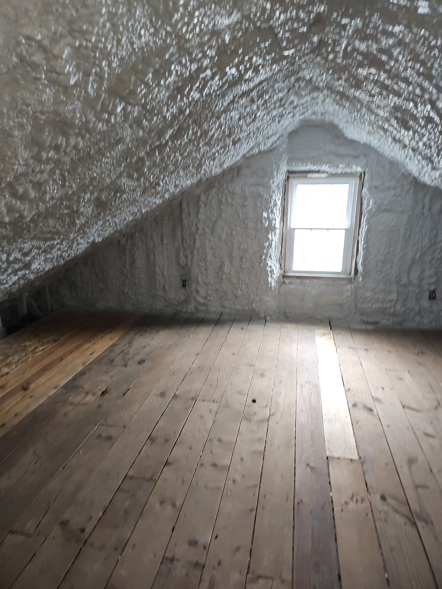 Attic Insulation using open cell spray foam by NYS Foam & Energy