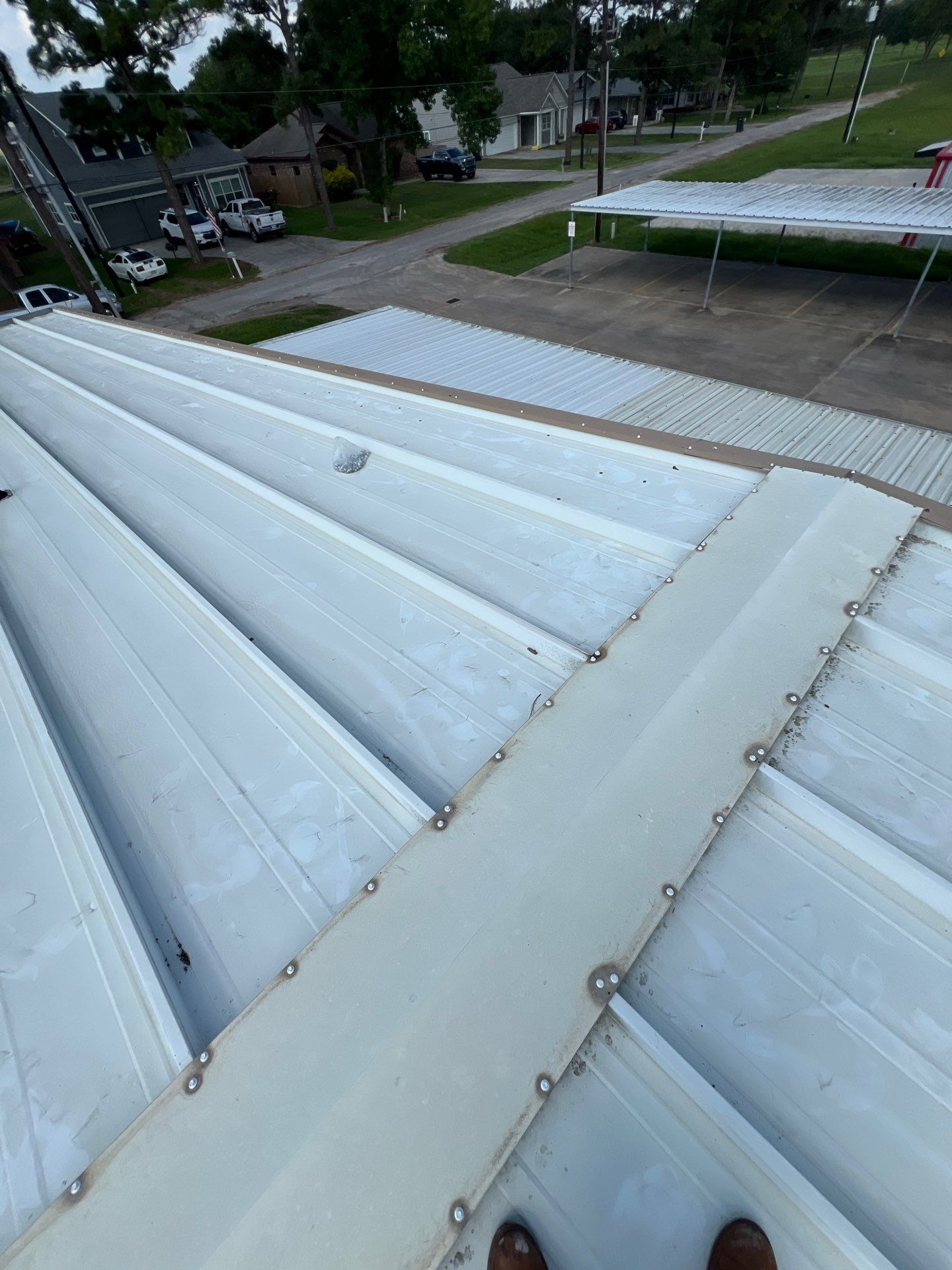 Commercial Roofing Repair using Metal by Roof Repair Company