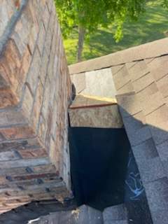 Cricket and Flashing Repair  by Rhino Roofing and General Contracting, LLC