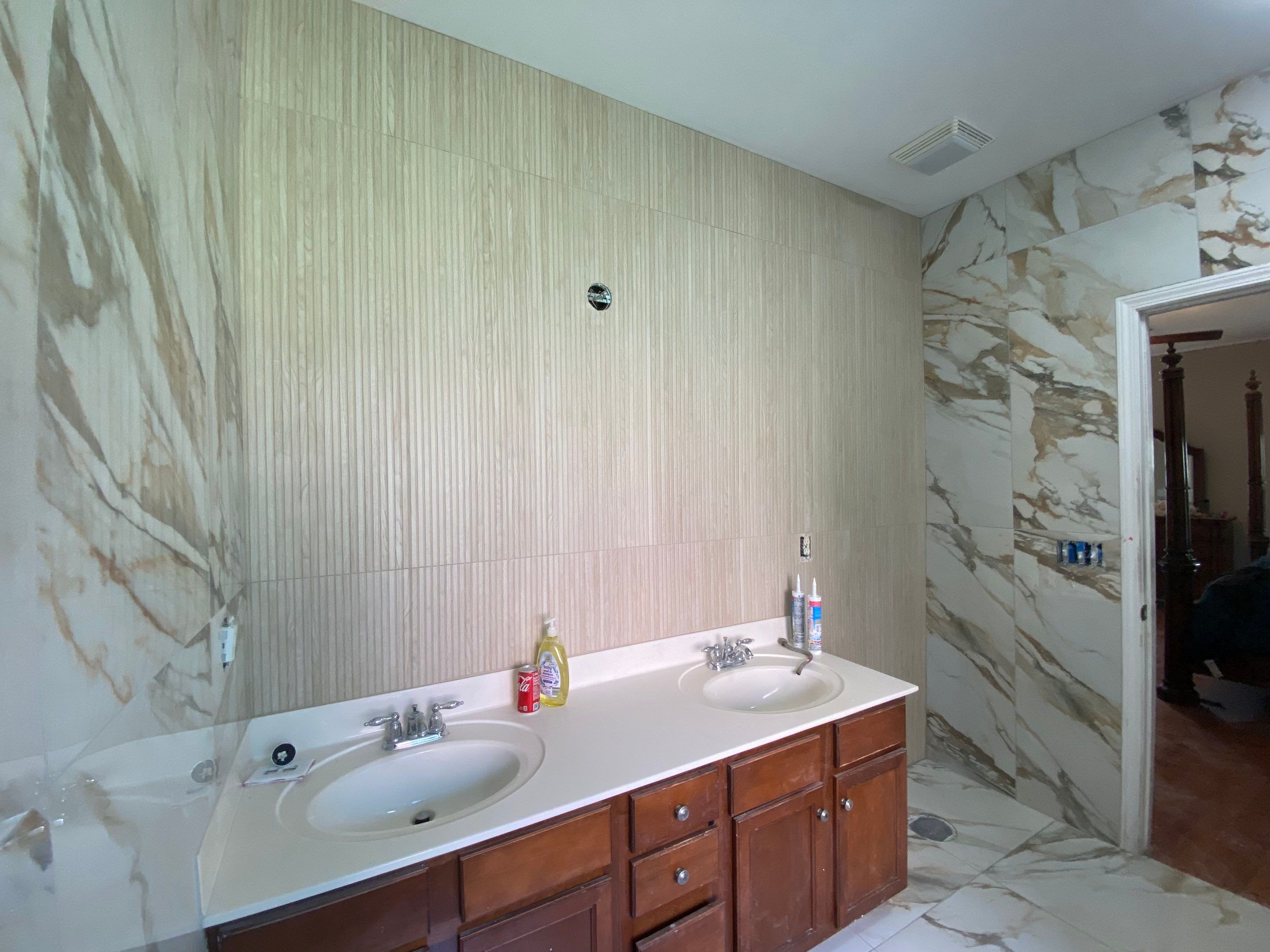 Beautiful new custom tile shower, tub surround and accent walls by Footprints Floors of Nashville