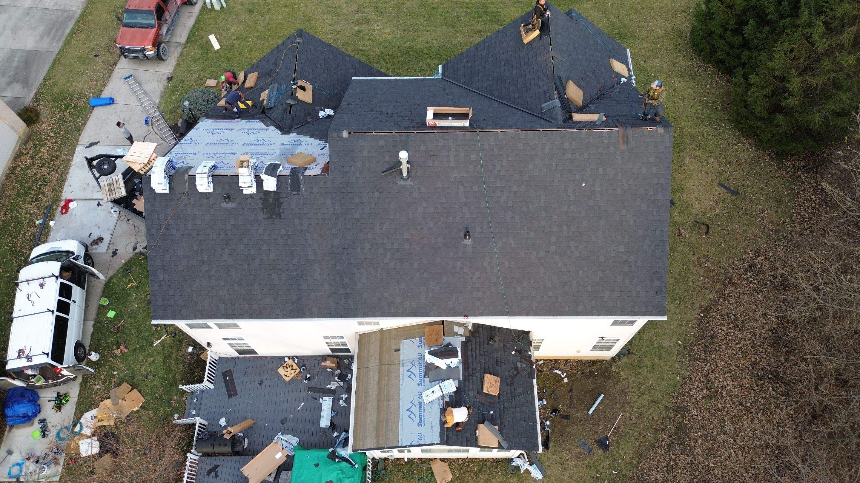 Walden Ponds - Pristine Black and Hydro Flo Gutter Guards by Tamlin Roofing