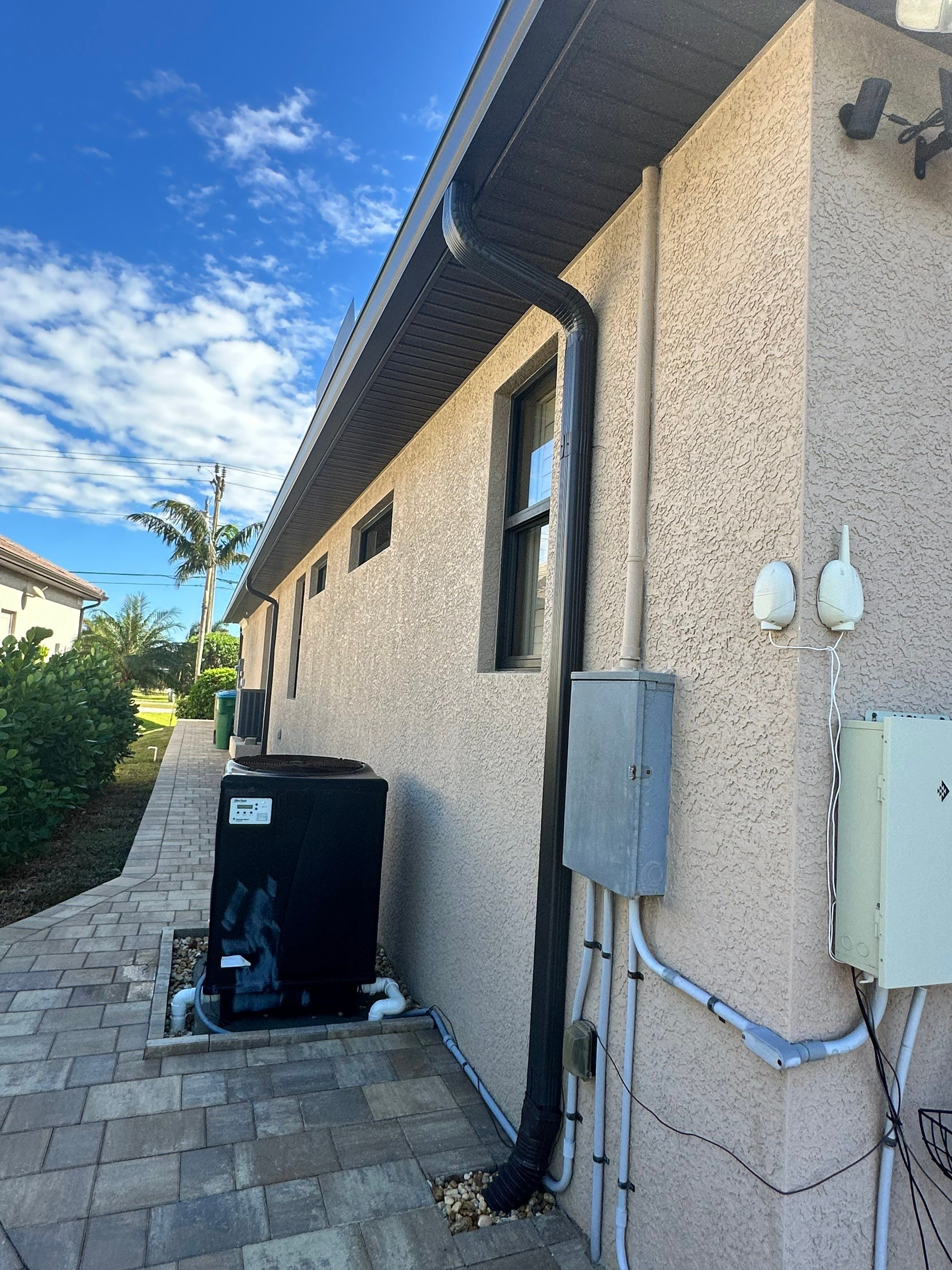 Bronze Downspout Installation in Cape Coral FL by Gutter Professors