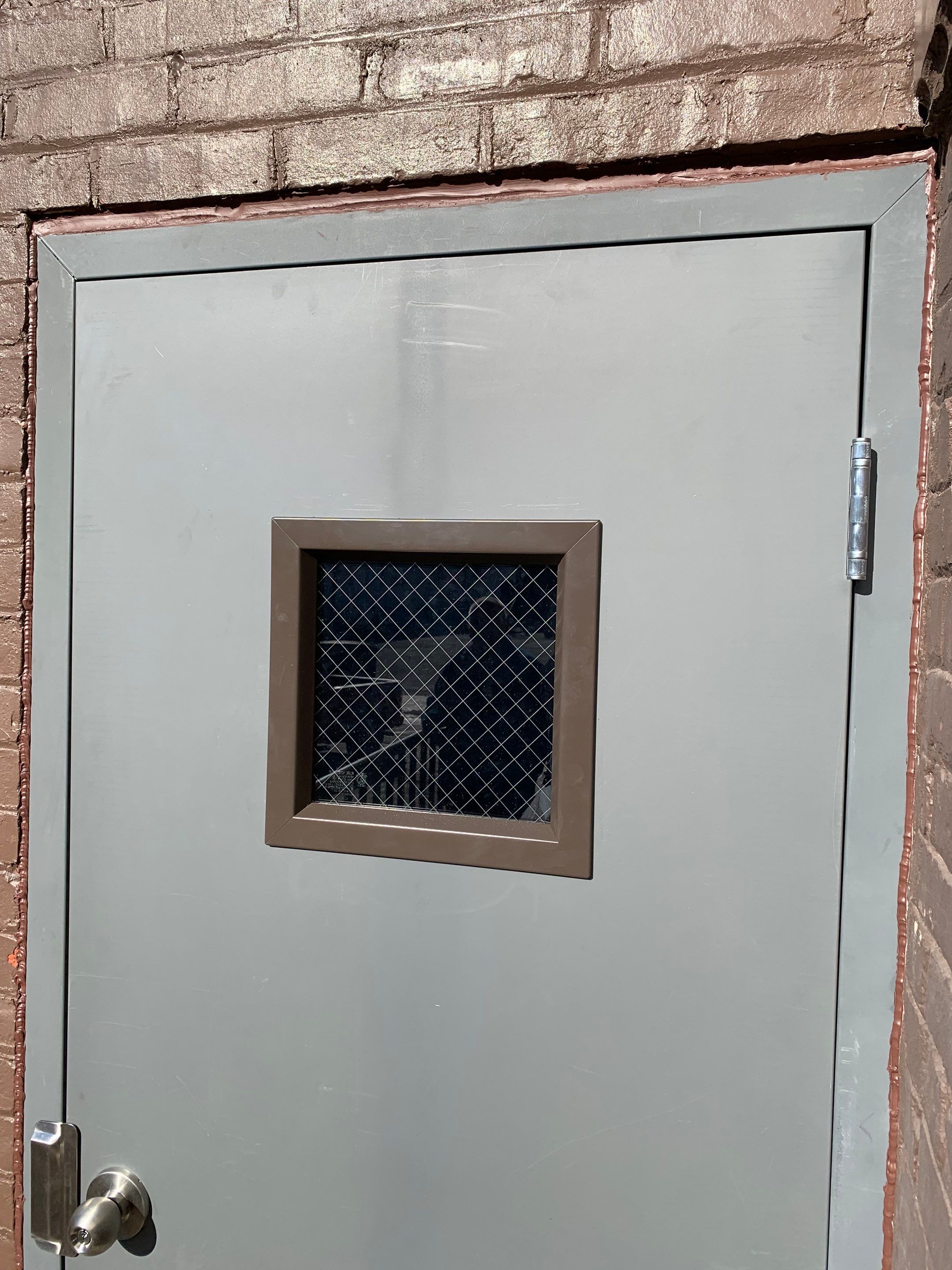 Exterior Commercial Steel Door by Secure Construction Company Inc