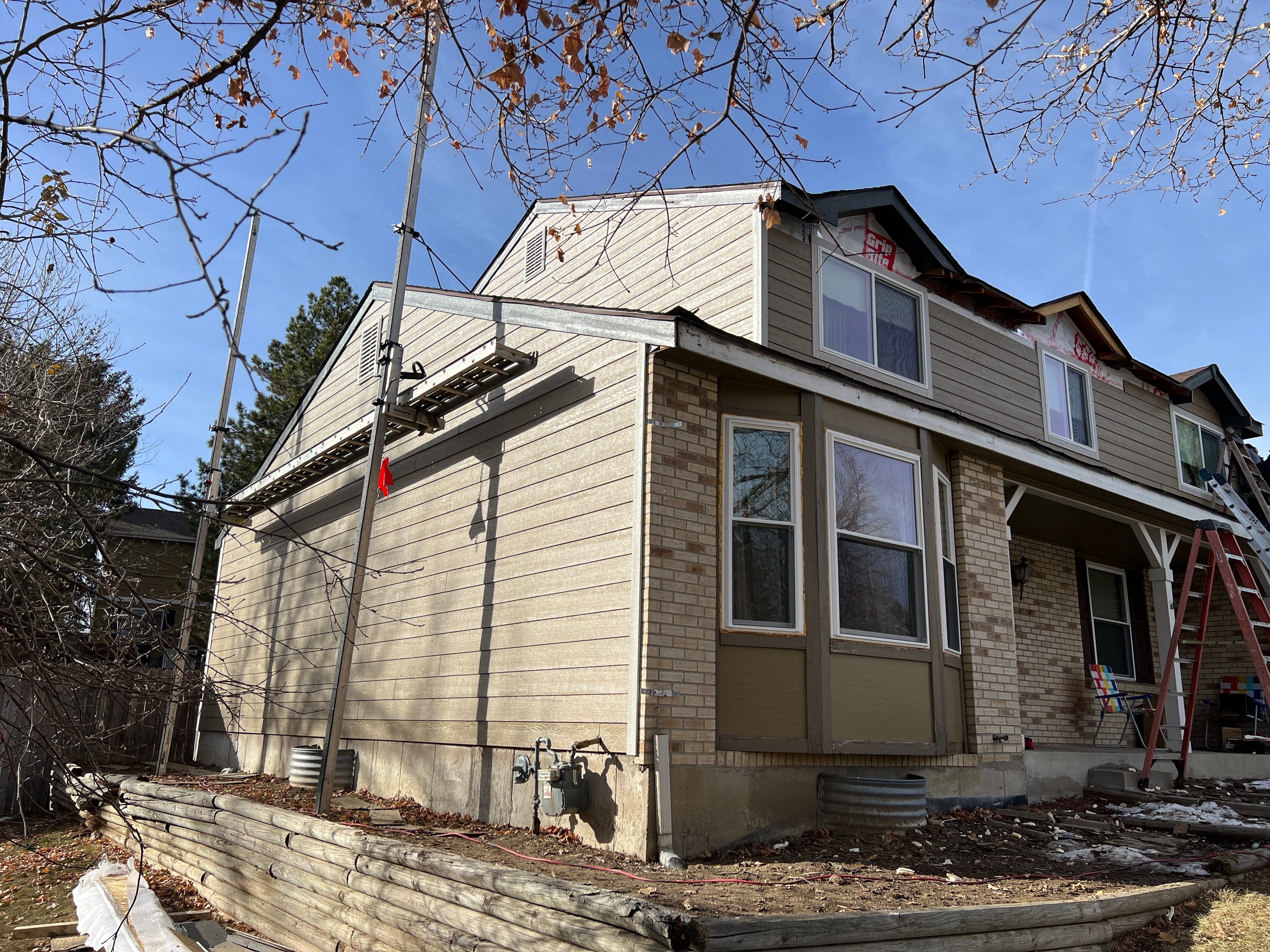 Siding Installation using LP Smartside Diamond Kote by United Windows and Siding LLC