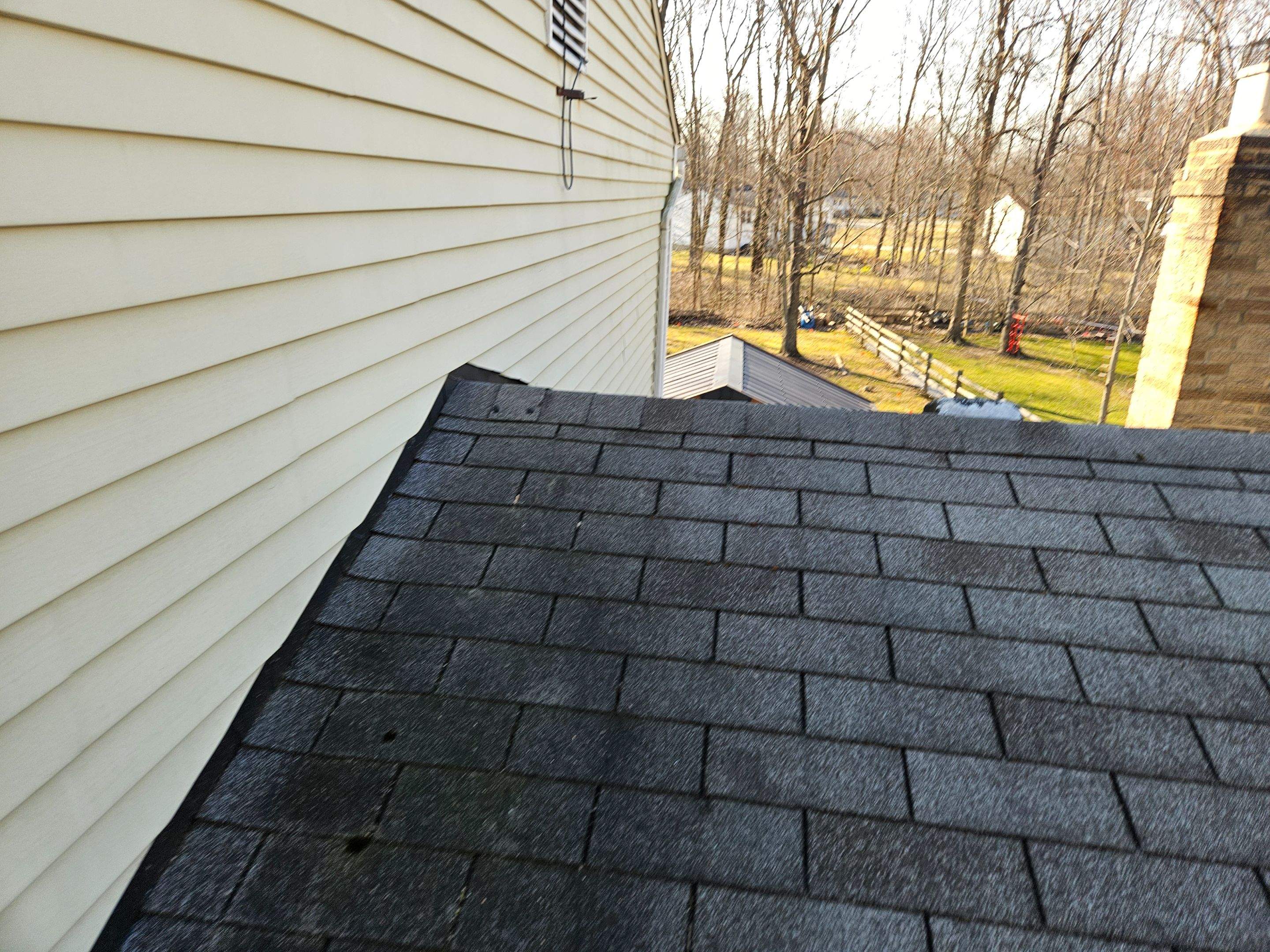 Roof, Siding, & Gutters by Absolute Roofing and Construction