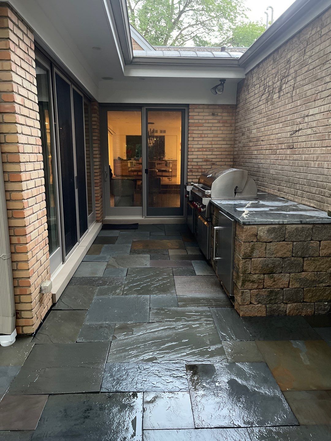 Bluestone patio cleaning by Northern Power Washing LLC.