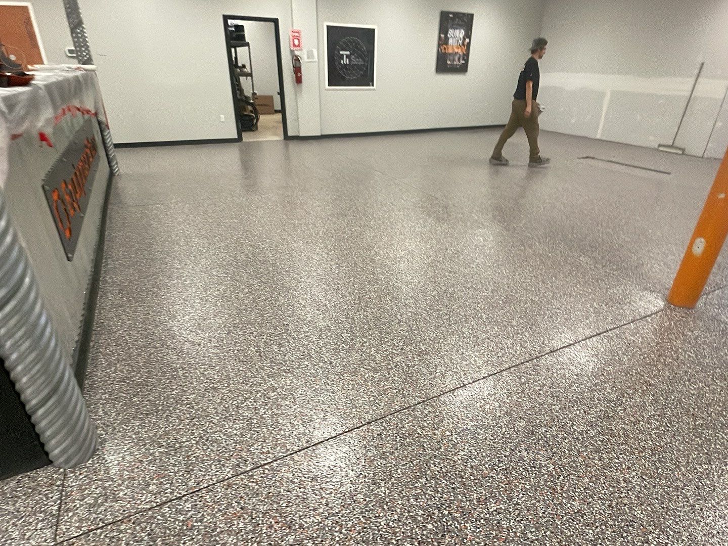 Equipment Share Commercial Floor Transformation using Smoke w/ 5% Orange by Croc Coatings, LLC