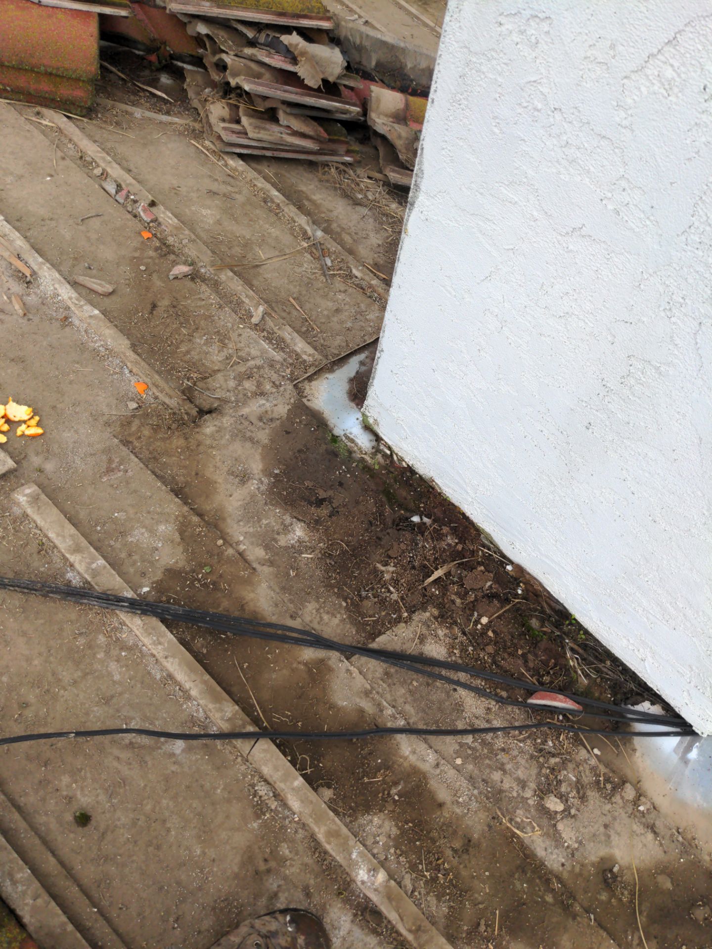 Tile refurbish project using existing tiles and replaced underlayment and battens by Straight Edge Roofing Inc