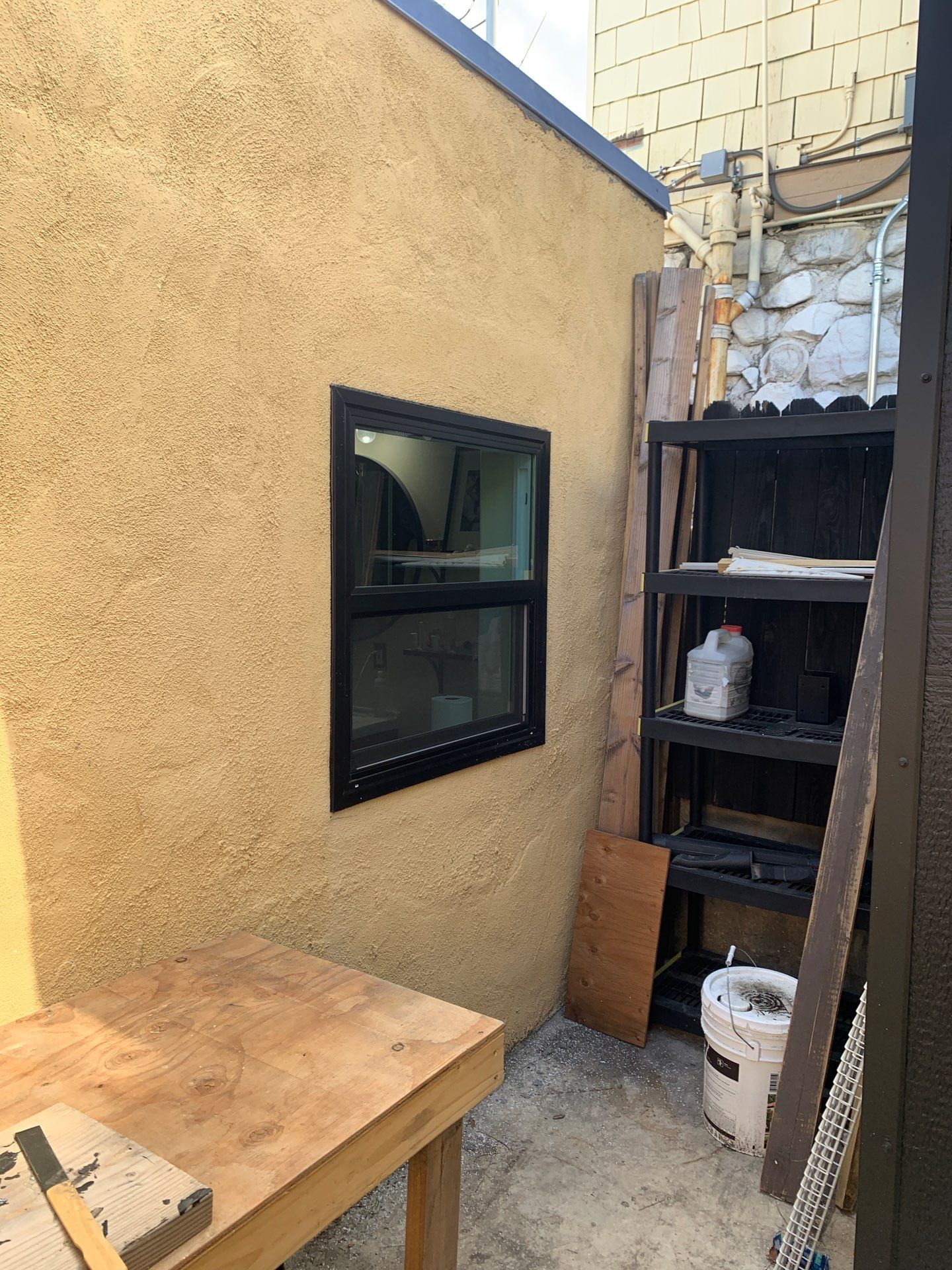Window Installation using Black Anlin windows by American Window Company