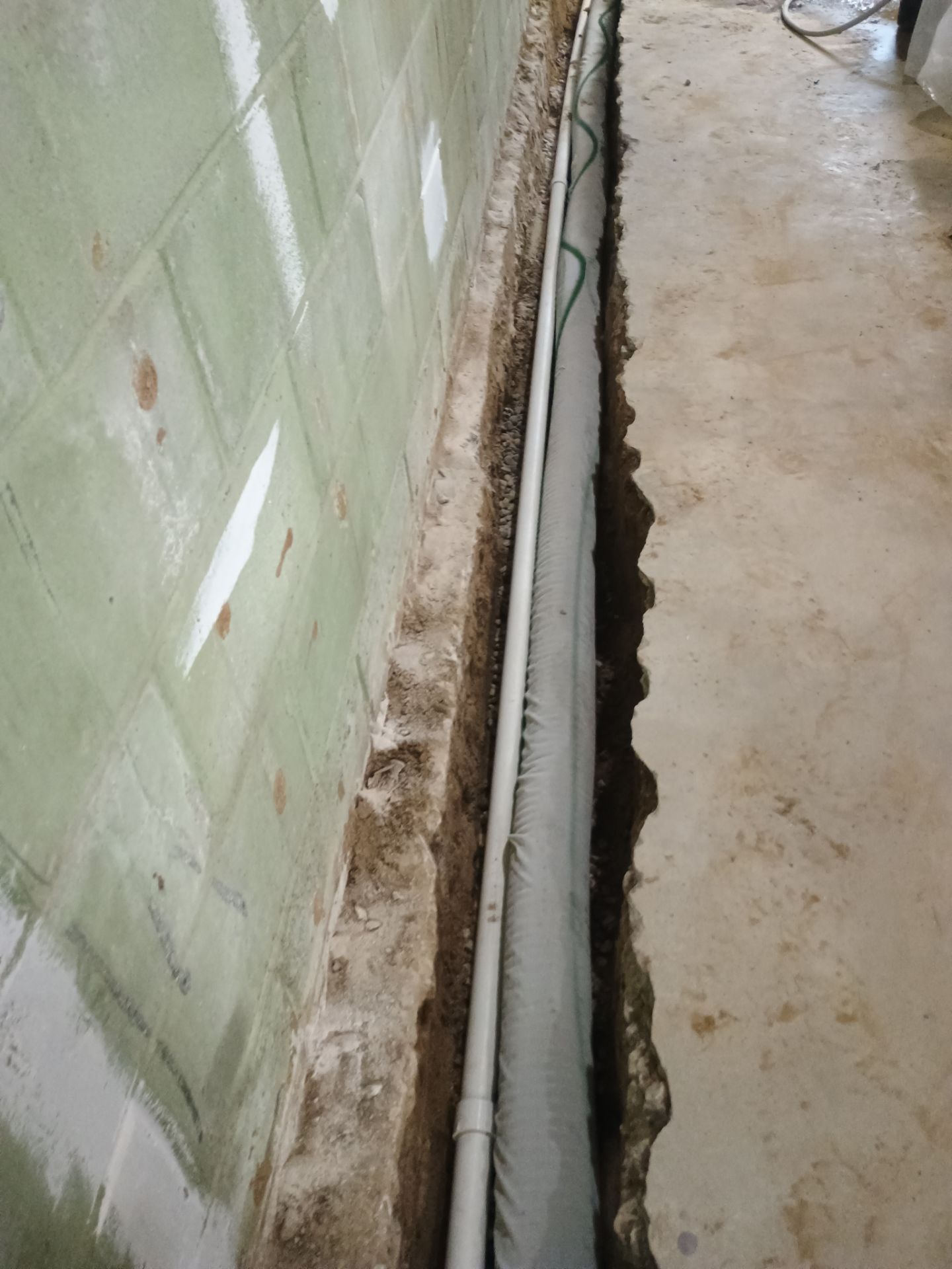 Interior Drain Tile & Wall Drainage in Southwest Minneapolis by Waterproofing Northeast