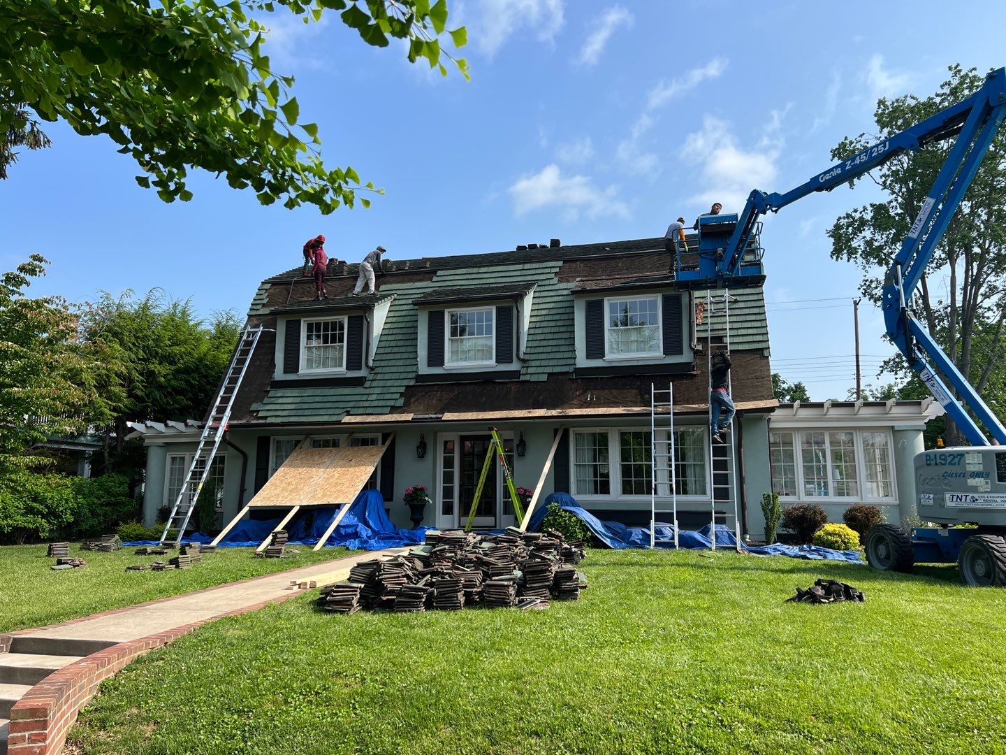 Slate removal/Cedar Shake replacement by Storm Contracting 