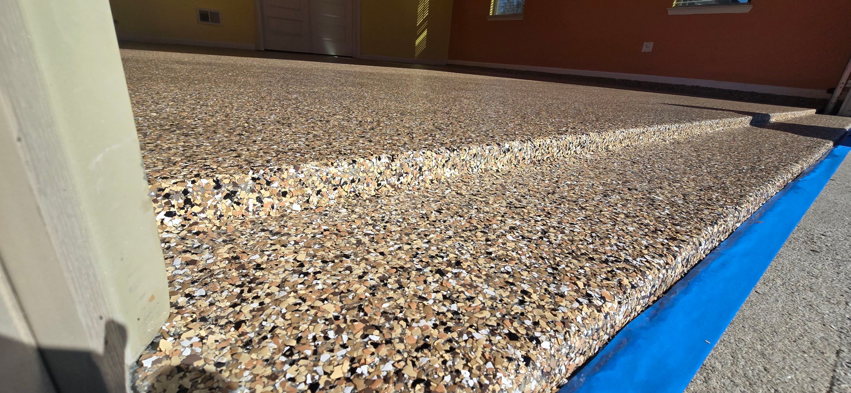 Garage floor transformation using outback color flake by Opus Renovations 