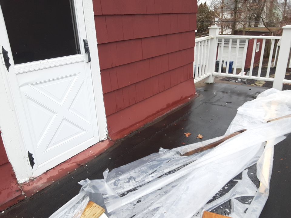 Residential Roof Replacement using Patio Roof by Absolute Roofing and Construction