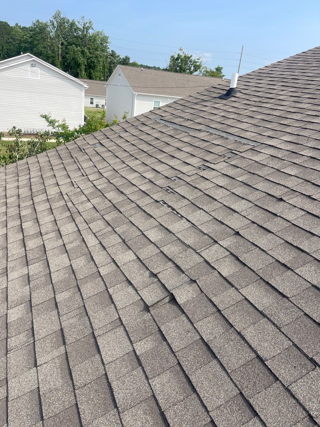 Residential Roofing Installation using Roof Replacement by American Roofing & Construction LLC