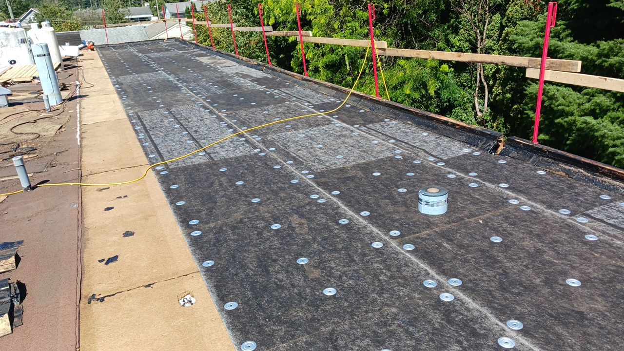 Residential ReRoofing Installation using IKO 2ply sbs  by Top Notch Roofing Inc