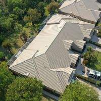 24ga 1.5" Mechanical Seam Sierra Tan by Total Roofing System The Metal Roof Experts