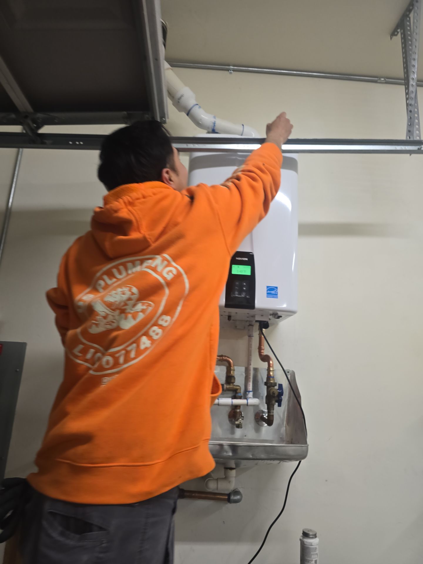 Water Softener, Moen Flo, and Tankless Water Heater Installation by Us Plumbing