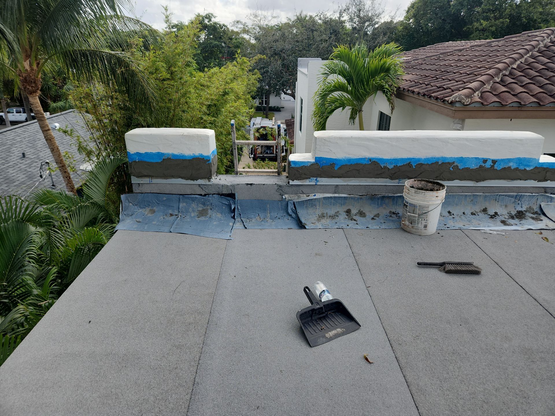 West Palm Beach Roof Restoration and Travertine Paver Driveway Installation by Aastro Roofing