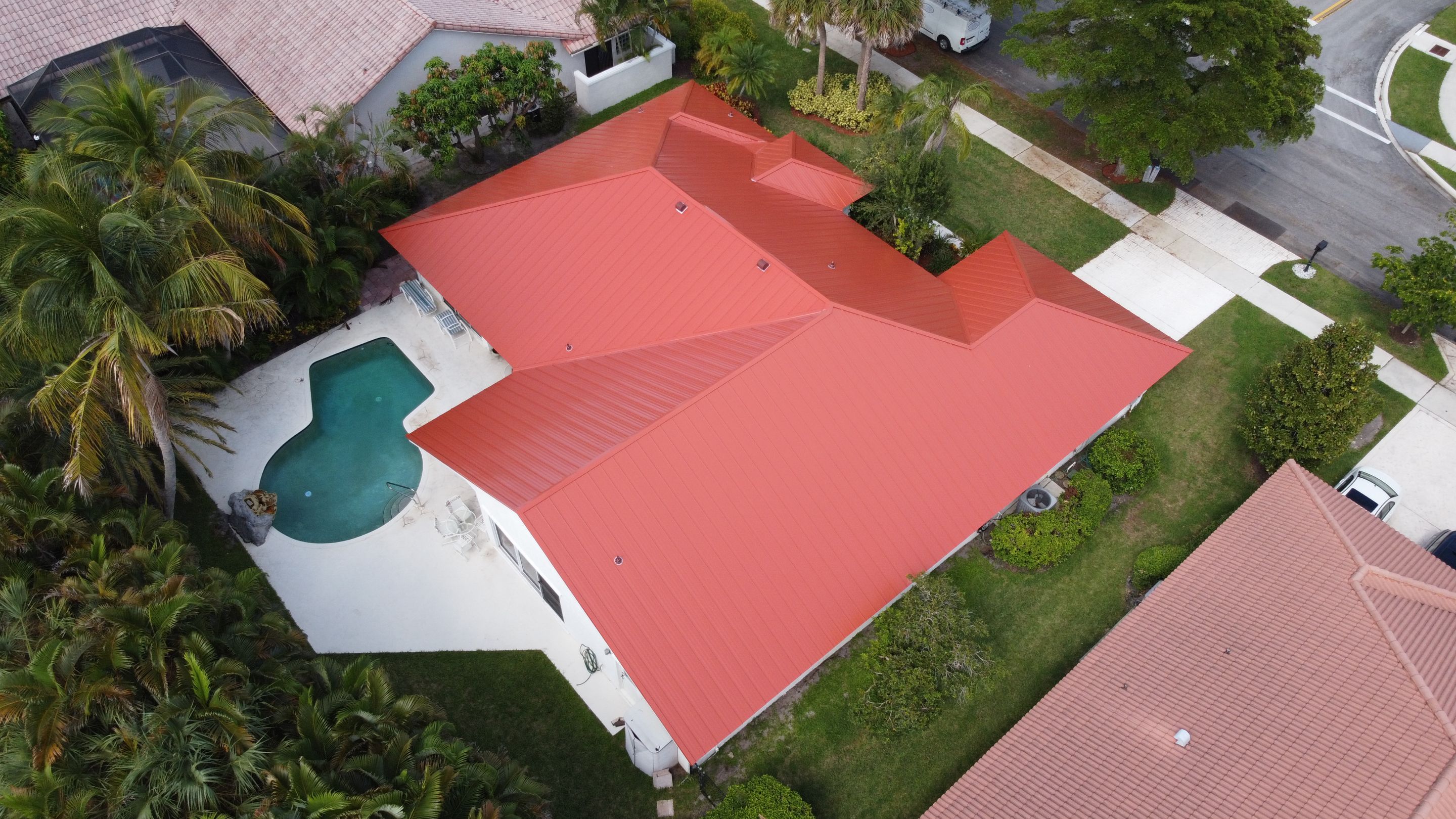 Residential Roofing Installation using 1" Nail strip metal roof by BLUES BROTHERS CONSTRUCTION CORP