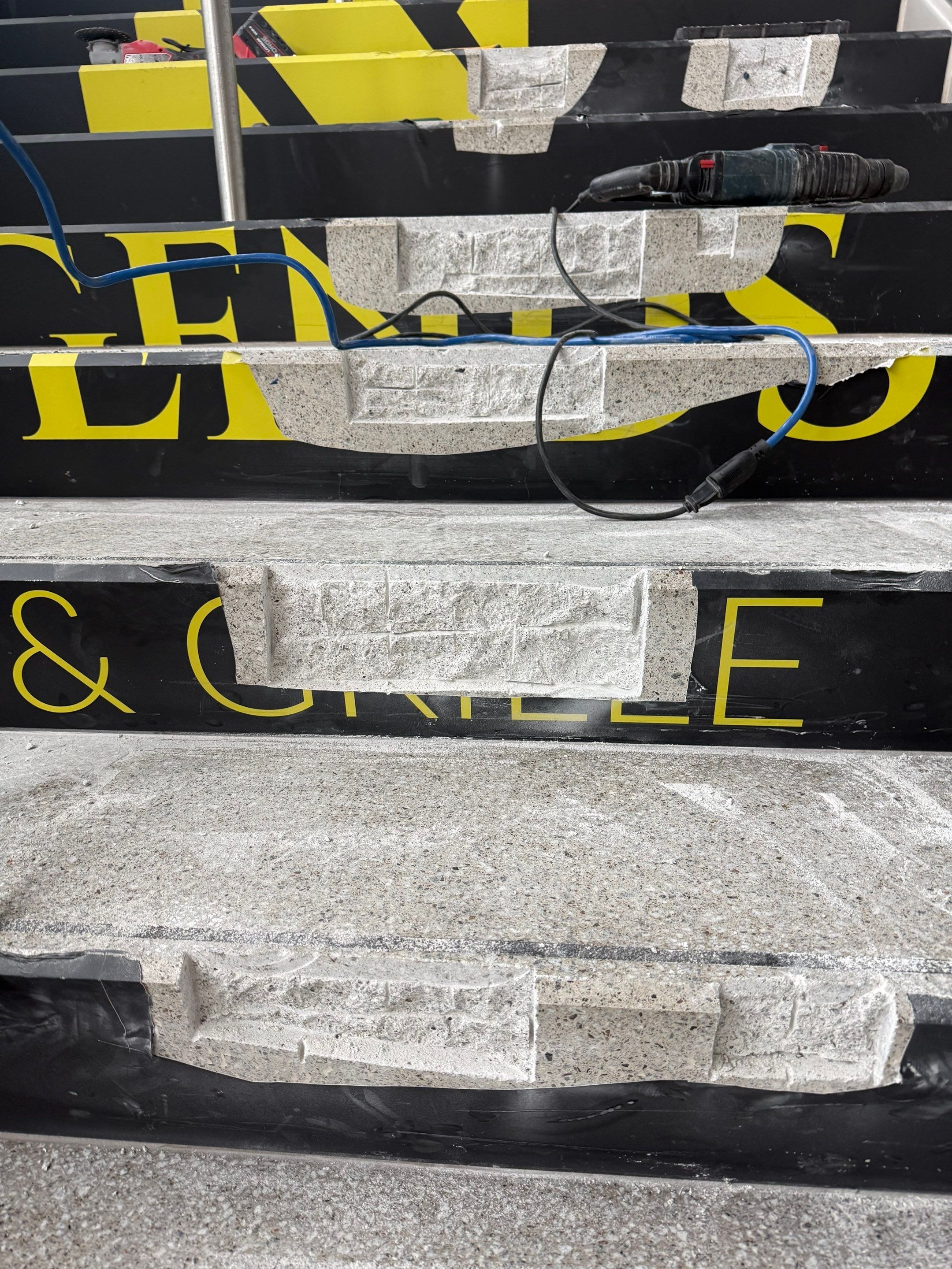 Concrete Stair Tread Restoration and Safety Upgrade in Sioux Falls by Select Painting, Coatings & Garage Cabinets