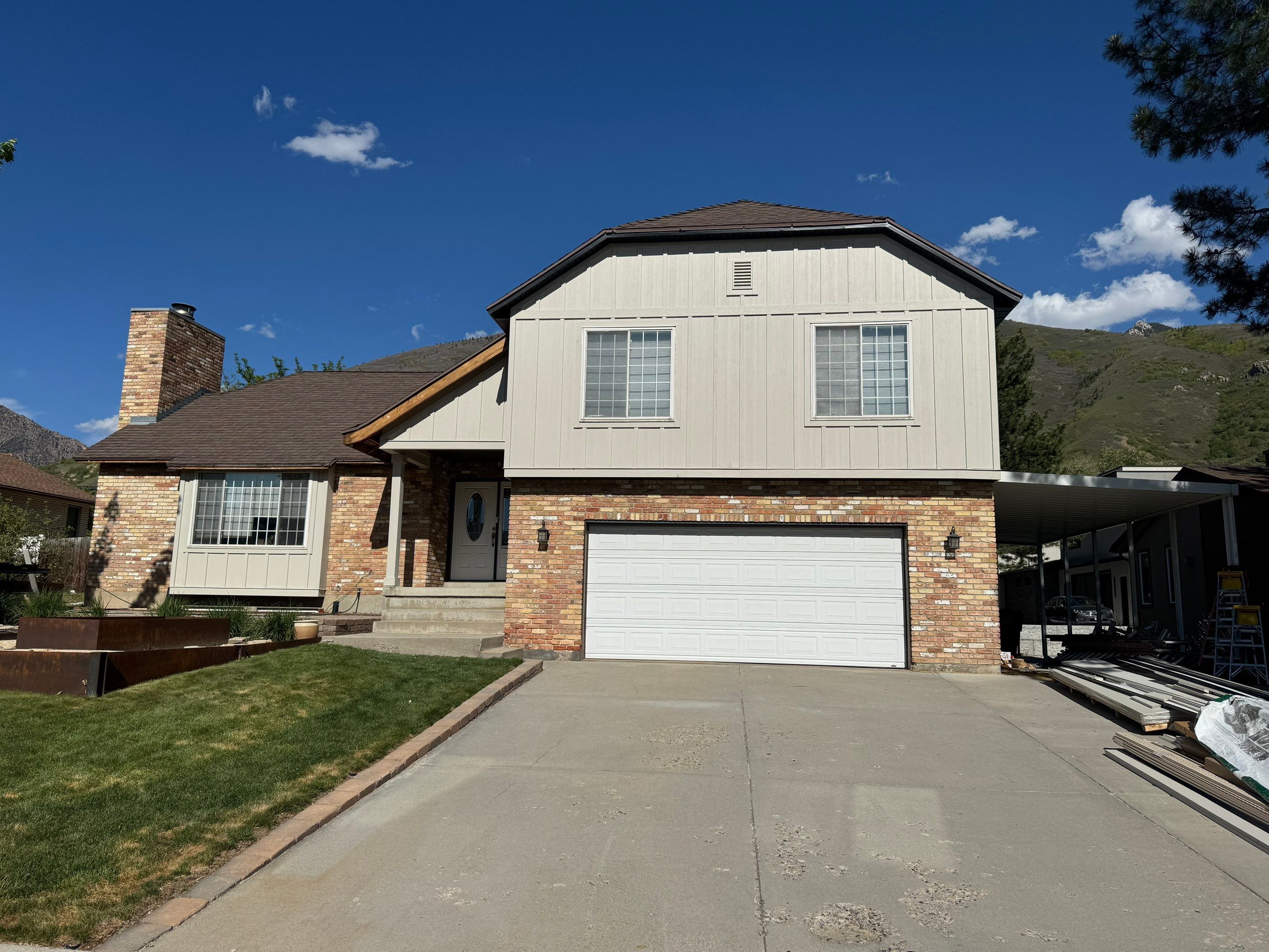Cottonwood Heights | Custom Hardie Exterior & Bold Fascia | Cobble Stone Accents by Ideal Siding Utah