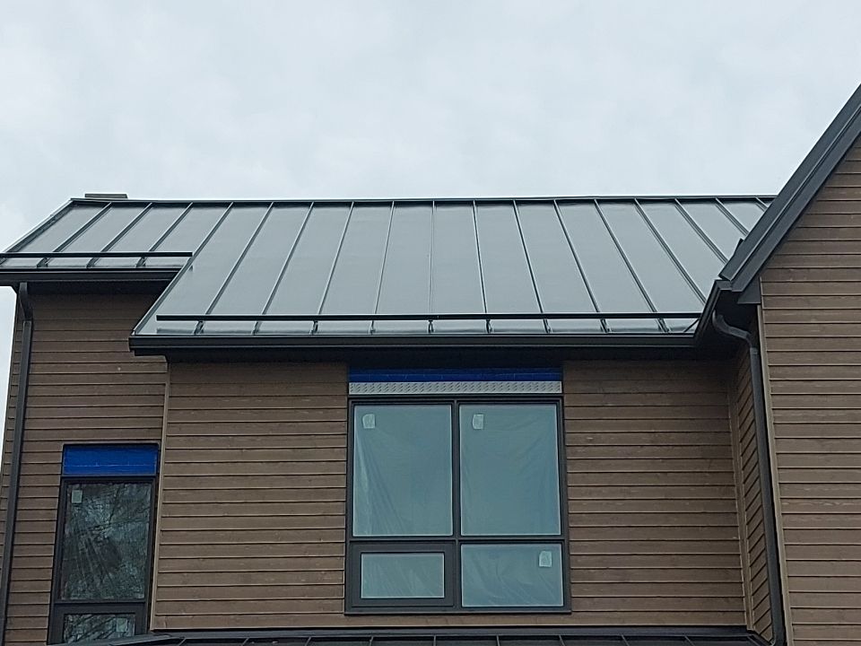 New Home Construction using 16" Standing Seam Panels by Jay Carter Roofing & Sheet Metal